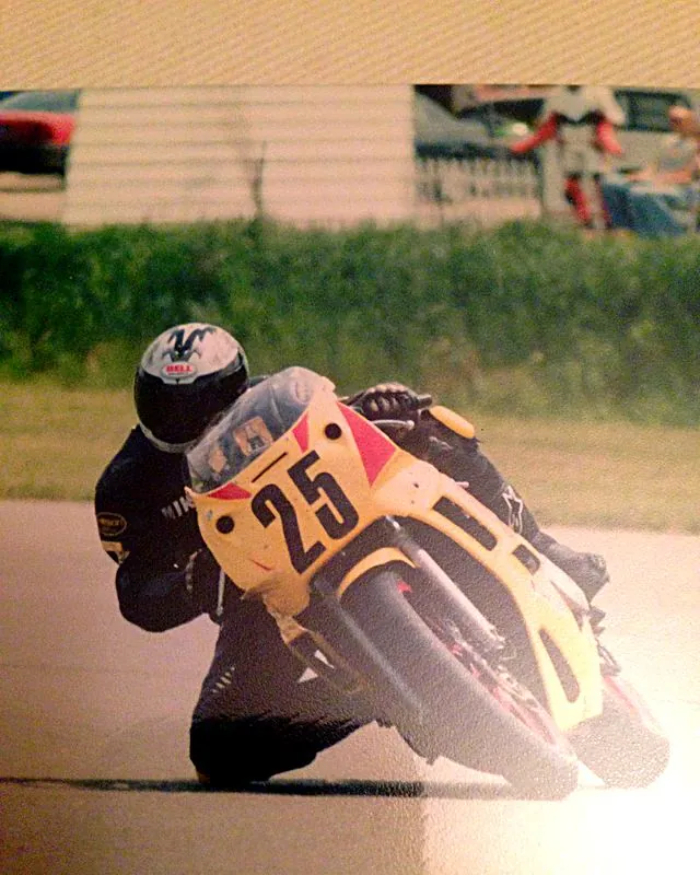 Russ racing a motorcycle